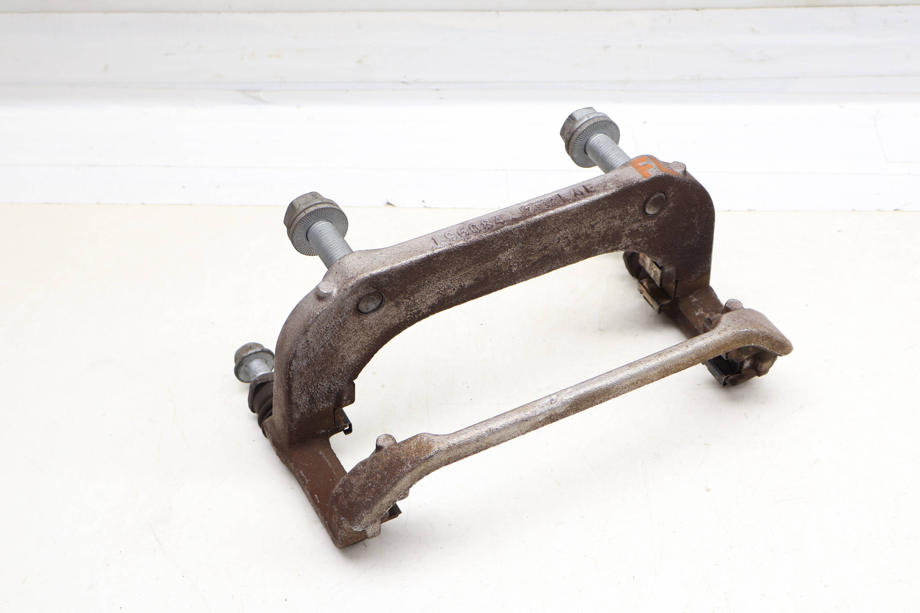 Brake Caliper Carrier / Bracket 1EA615125B