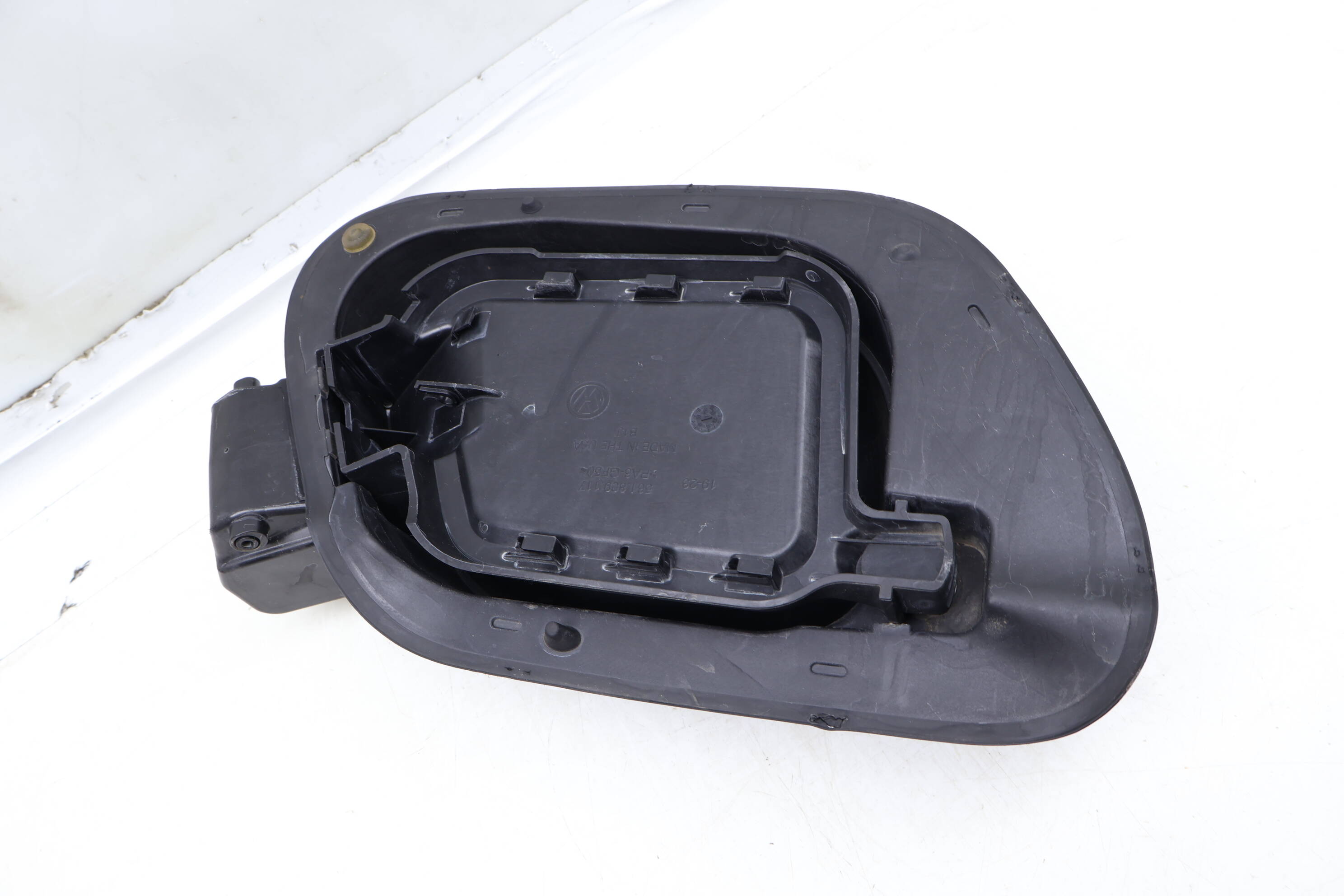 Fuel Filler Door Housing / Bracket 561809857L