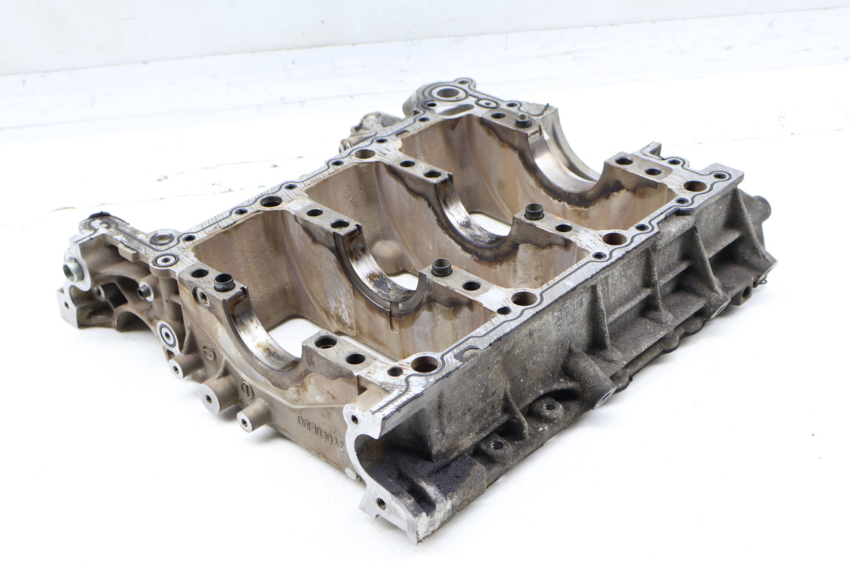 Crankshaft Mount / Lower Engine Block 06E103011BS