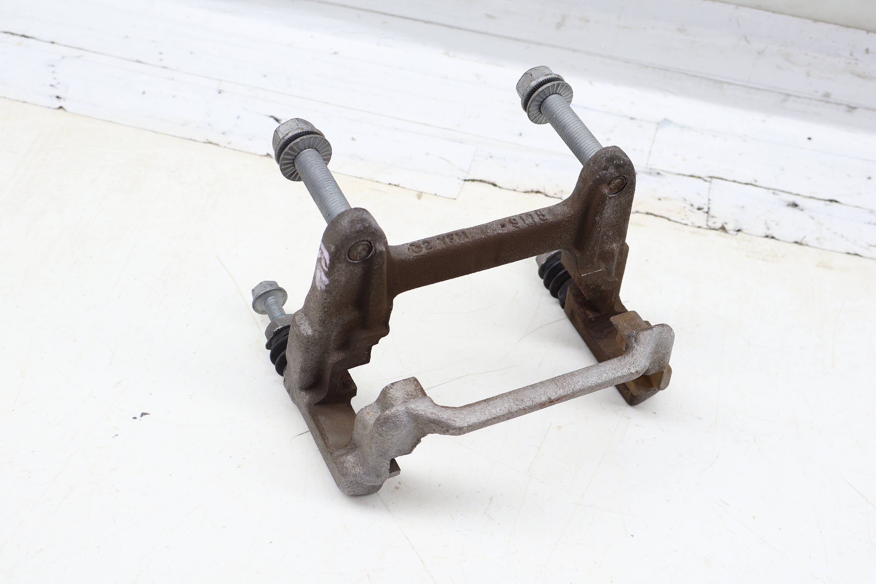 Brake Caliper Carrier / Bracket 80A615425A