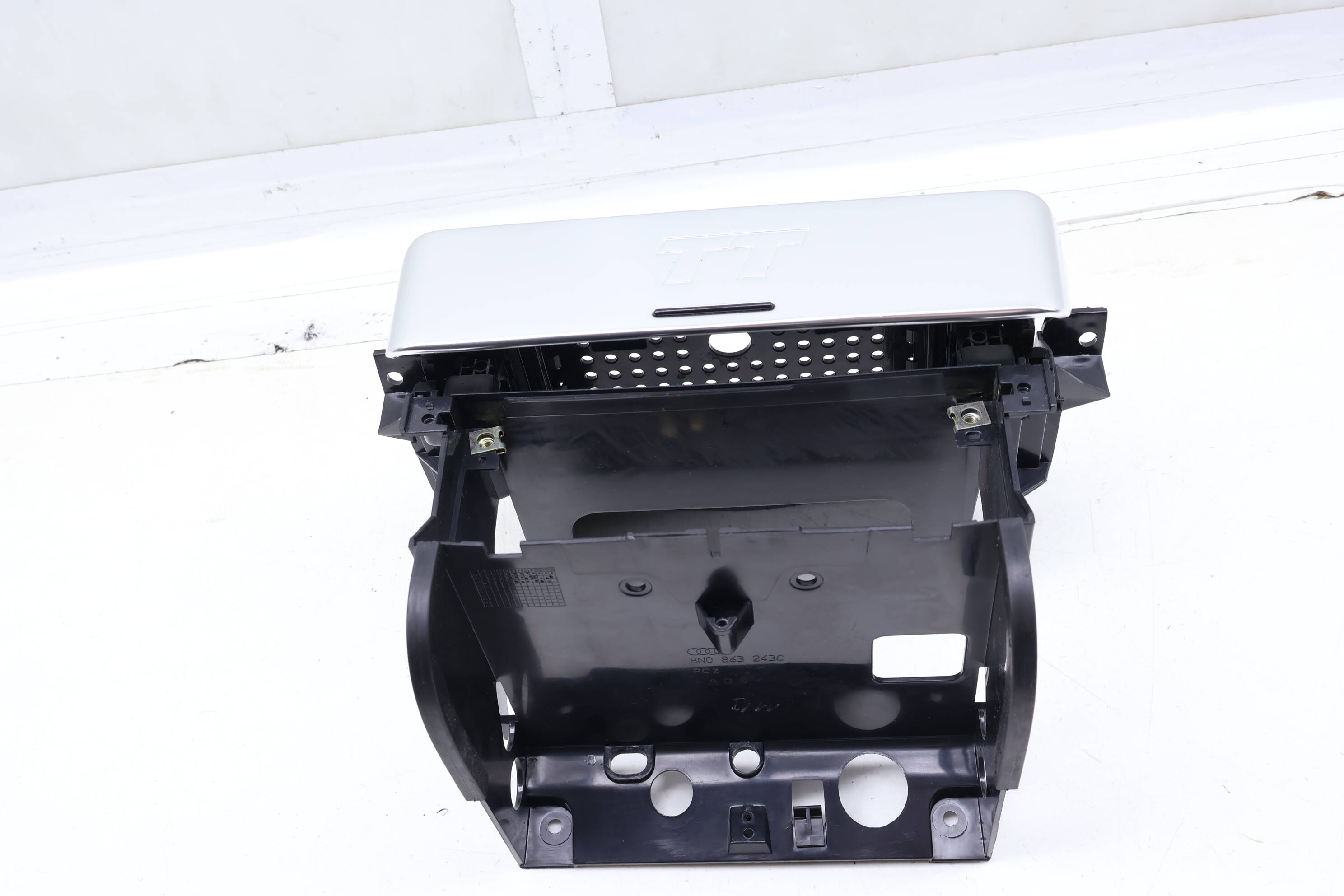 Stereo Radio / Climate Control Mounting Bracket 8N0863243C